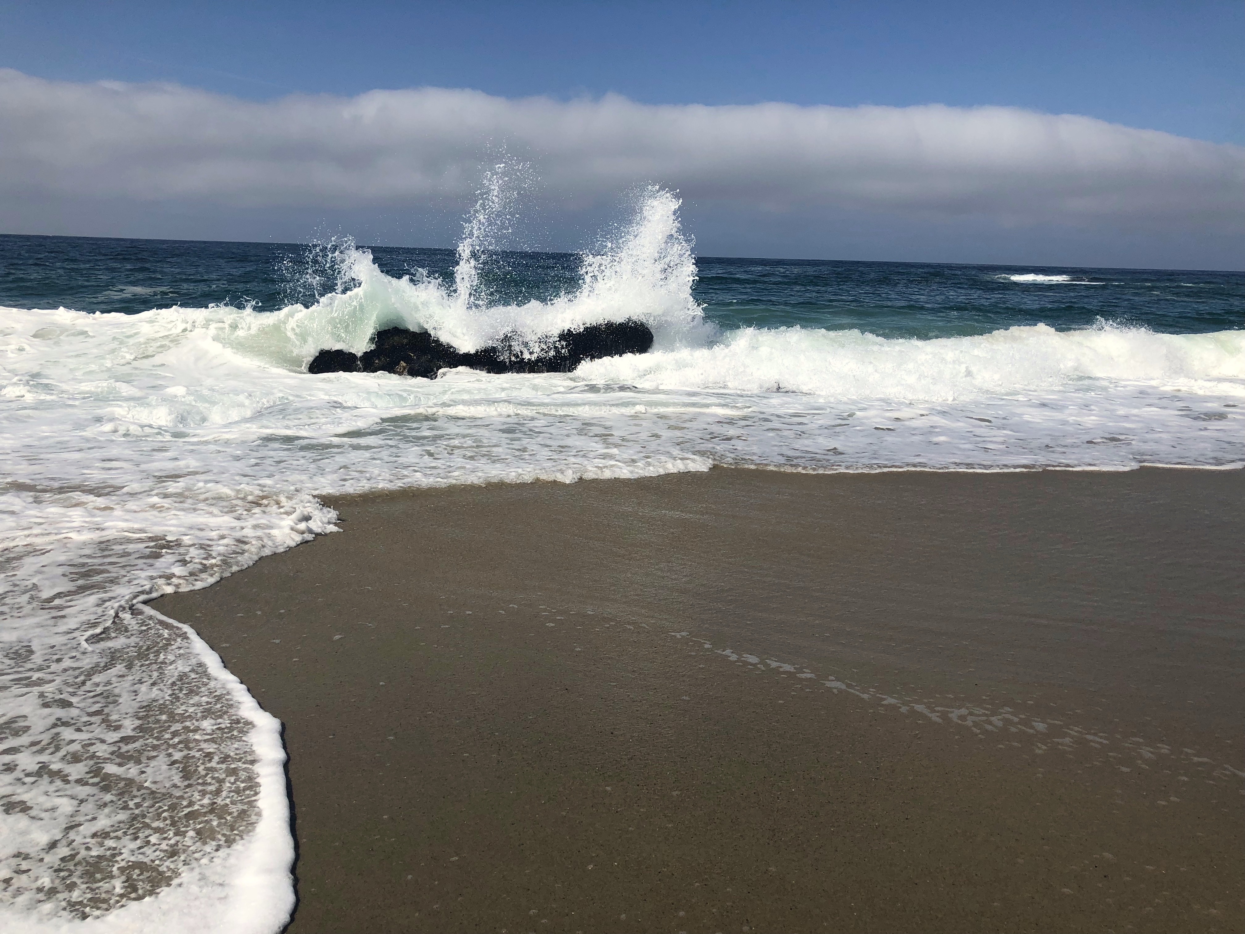 Waves crashing on West Street Beach