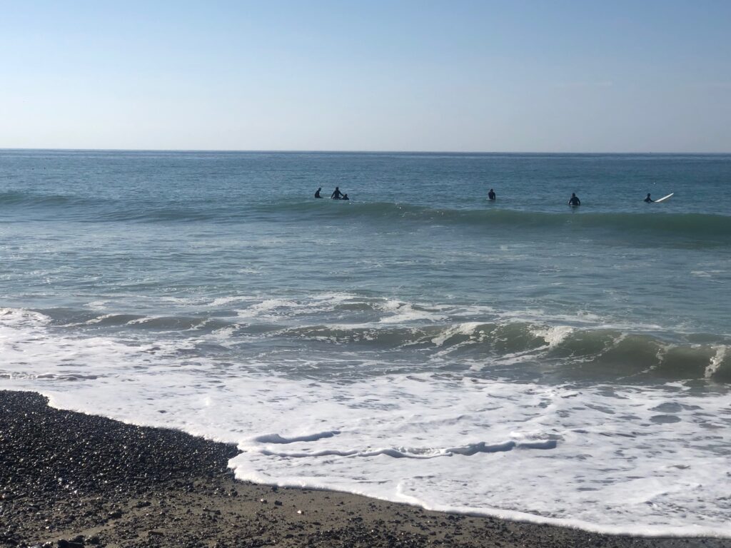 Surfers at Poche Beach