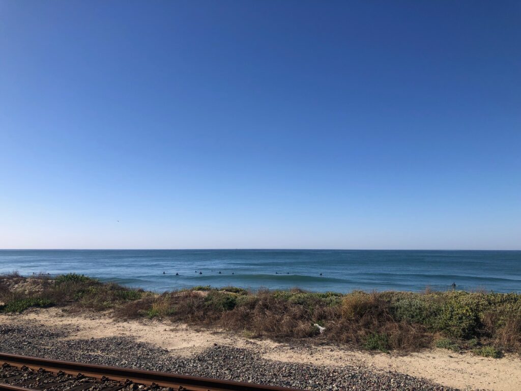 Surfers off North Beach